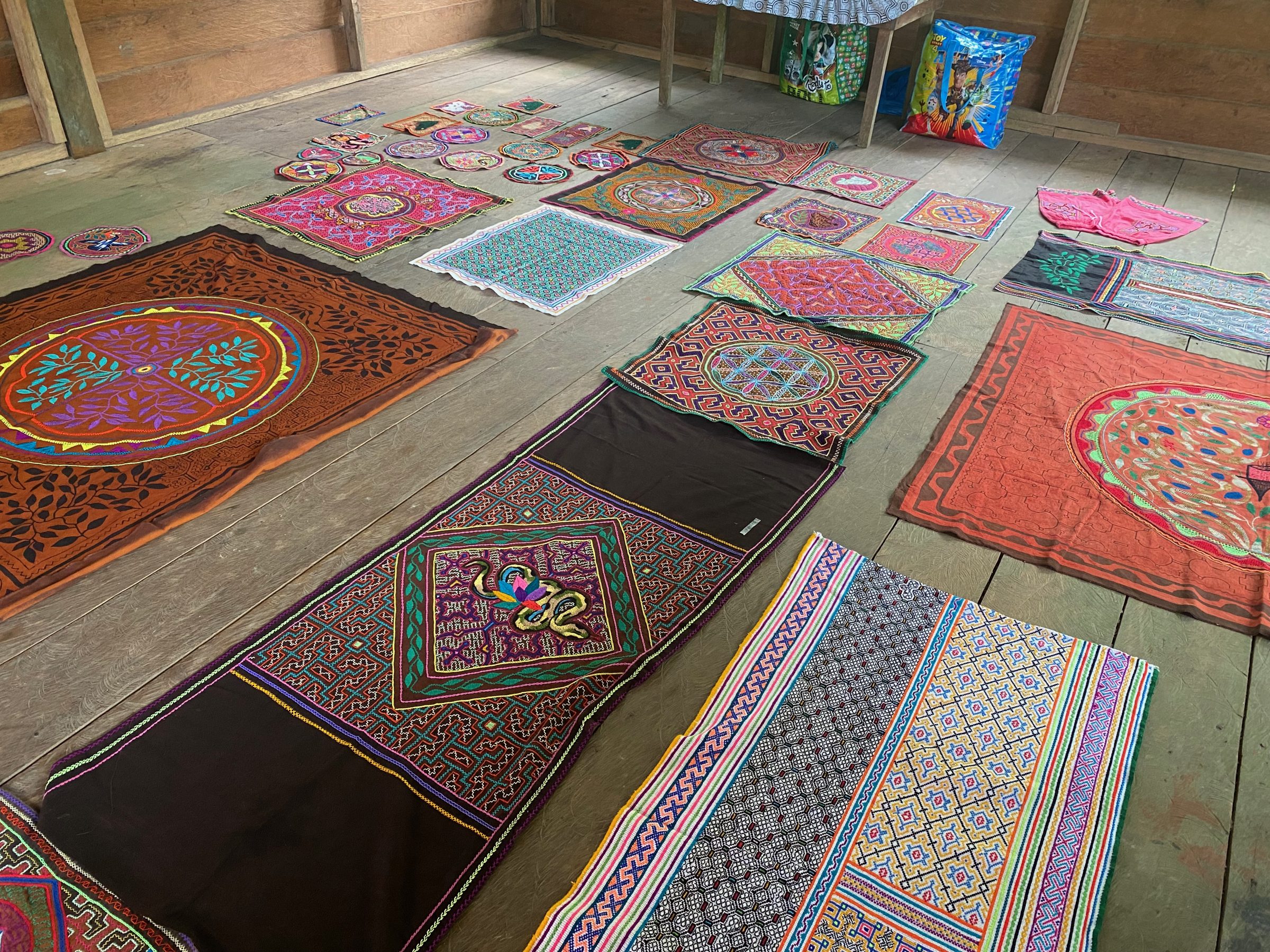 Shipibo mandalas laid out on the floor